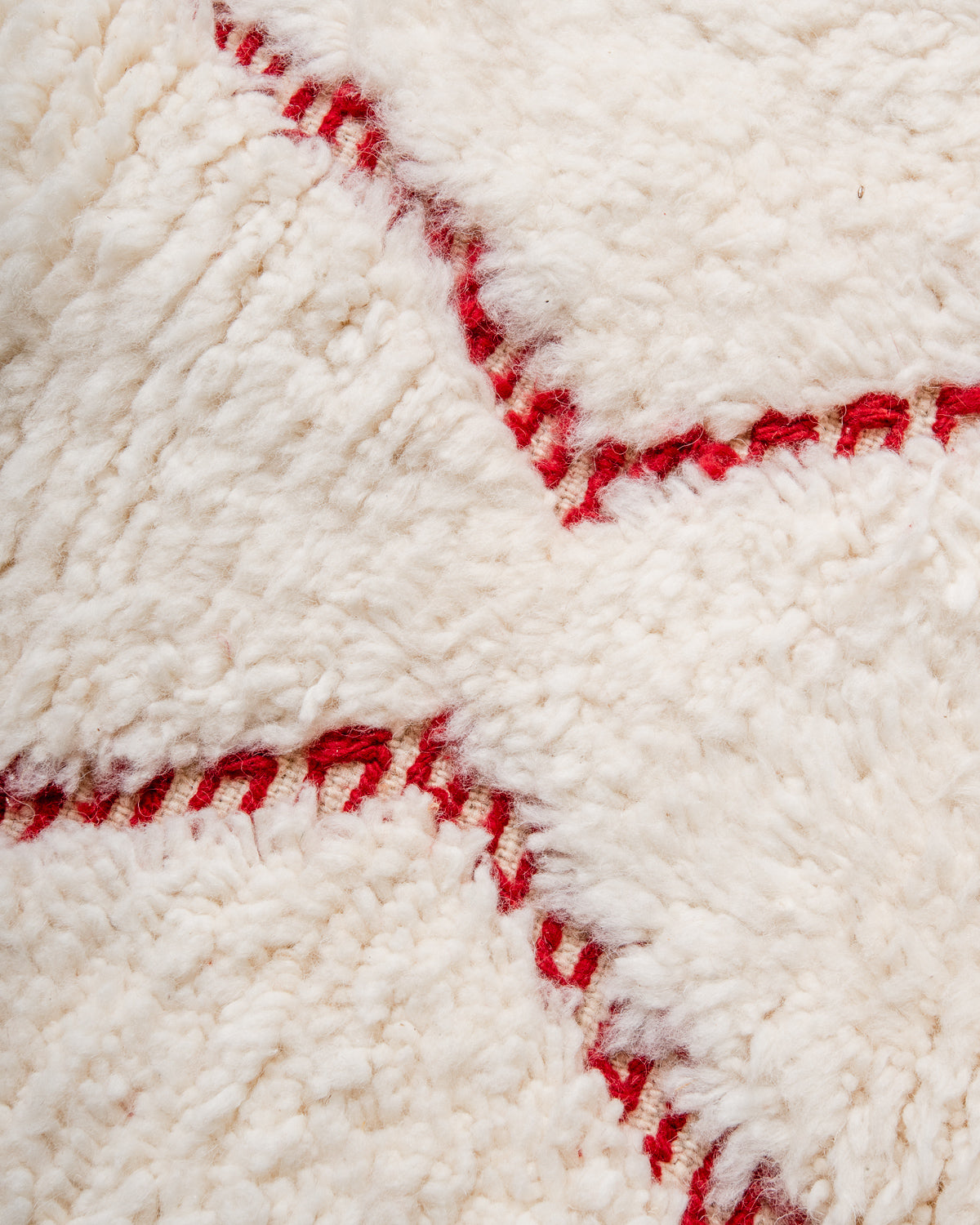 Modern, designer, handcrafted Berber rug from Morocco. Beniourain carpet with beautiful colours and patterns and fluffy wool texture.